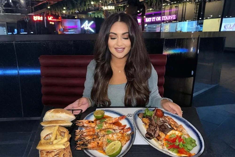 Beautiful young lady with delicious food